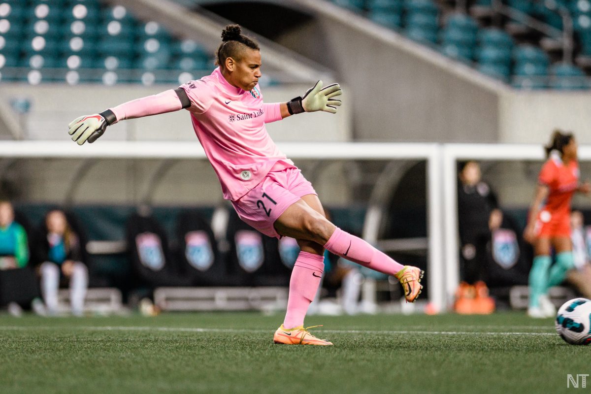 Kansas City Current goalkeeper AD Franch kicks a ball out of the box during a match against OL Reign. (Photo by Nikita Taparia)